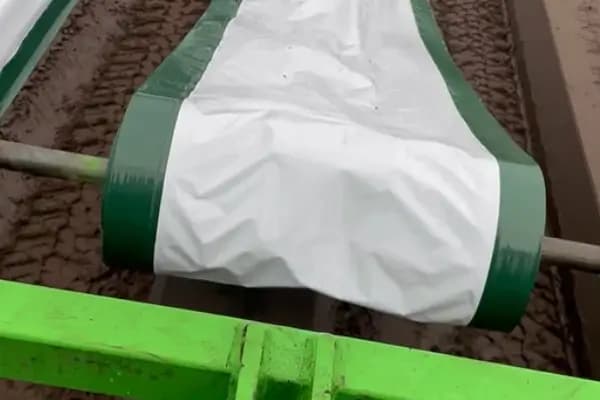 Film is laid onto the dams